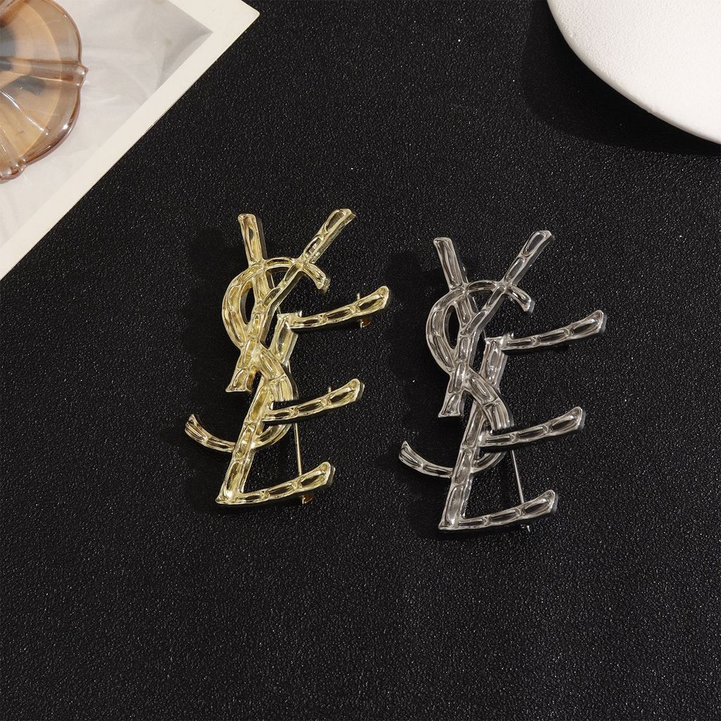 เข็มกลัดแบบเกลียวสำหรับเสื้อกันหนาวและเสื้อสูท ออกแบบโดย W Yang Shulin