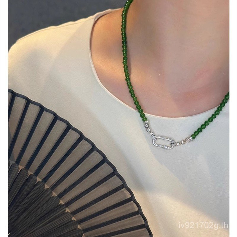 Universal Buckle ฤดูใบไม้ร่วงฤดูหนาว Pearl White Light Luxury Niche Chalcedony High-End ใหม่จีนหญิงส