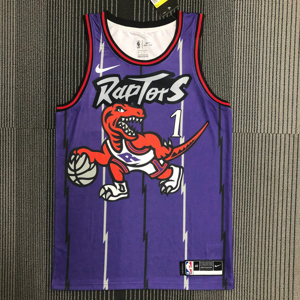 เสื้อยืดกีฬาแขนสั้นผู้ชาย Toronto Raptors ลายทีม Tracy McGrady สีม่วง