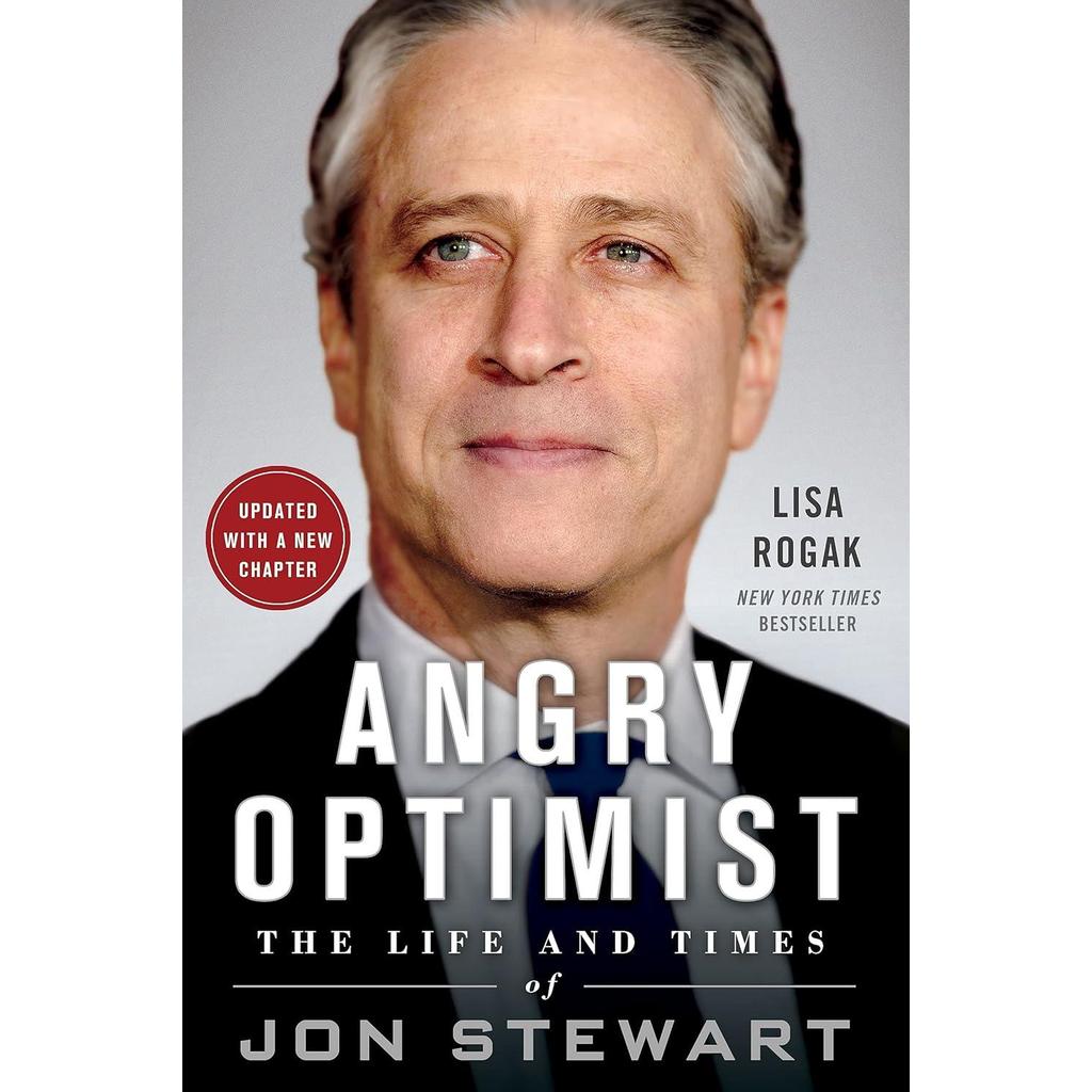 [BnB] USED Angry Optimist: The Life and Times of Jon Stewart โดย Lisa Rogak (มือสอง: Like new)