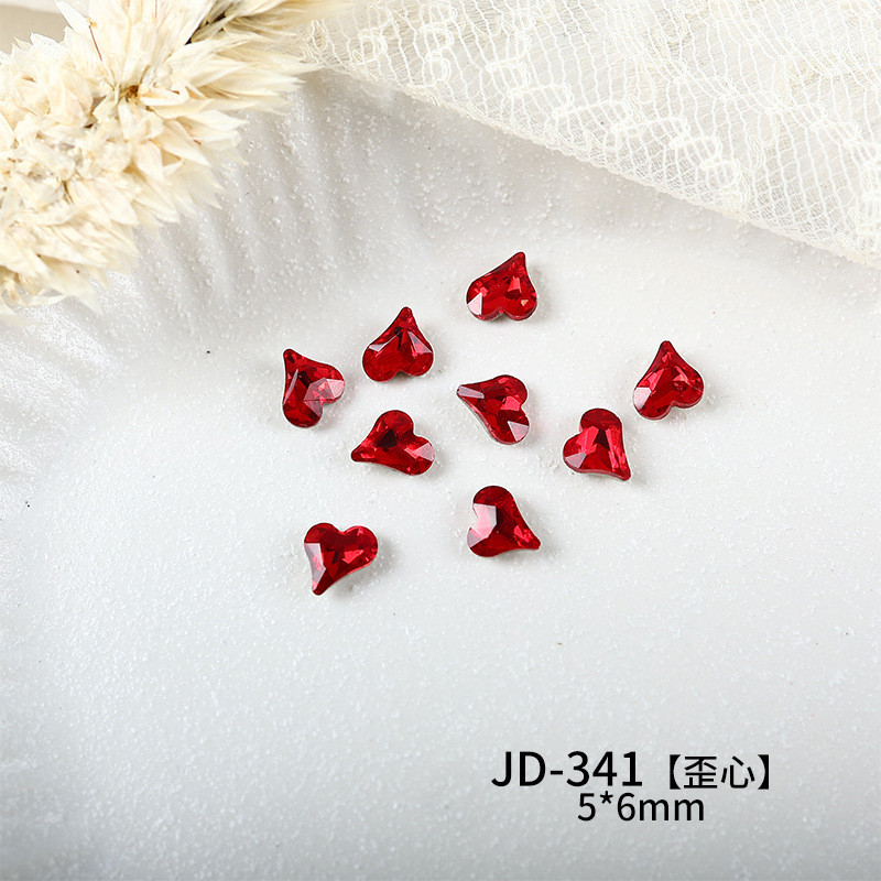 10ชิ้นแพ็คสไตล์ใหม่บิ๊กสีแดงชี้ด้านล่างเพชรหลวมอุปกรณ์แต่งเล็บรักคดเคี้ยวหัวใจยาวผสมเล็บสามมิติตกแต่ง - รูปที่ 4