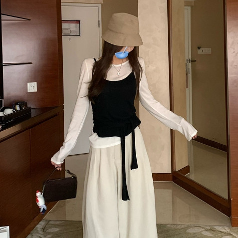 Paula พร้อมส่ง🌴เสื้อยืแขนยาวผู้หญิง🌴เสื้อ2ชิ้นติดกับดีไซน์โปว์ผูกเอว เสื้อครอปทรงเข้ารูป สีดำ คอกลม ลำลอง แฟชั่นผู้หญิ - รูปที่ 4