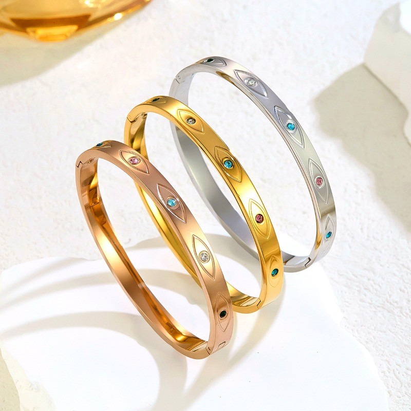 สร้อยข้อมือเหล็กไทเทเนียมตาปีศาจ ชุบทอง 18K สำหรับผู้หญิง พร้อมแบบสแตนเลสชุบสูญญากาศ