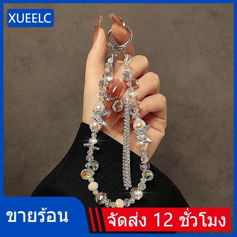 Xeelct ห่วงโซ่โทรศัพท์คริสตัลผีเสื้อพู่หรูหราเบาพร้อมการตกแต่งโซ่ผีเสื้อมุกเสน่ห์กระเป๋าและเชือกคล้องพวงกุญแจ