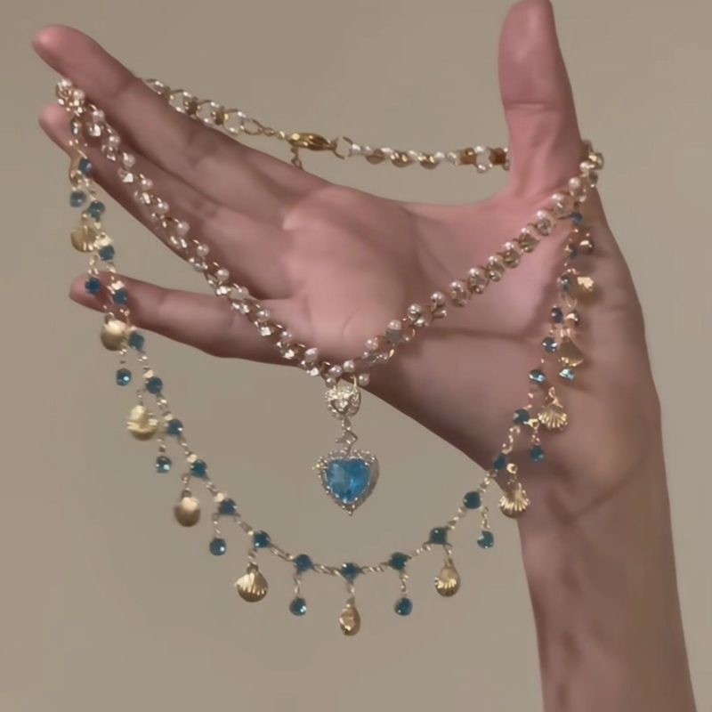 Aquamarine < สร้อยคอพู่ความรู้สึกระดับไฮเอนด์ Falling in the Moon Micro Shell Zircon Stacked Clavicl