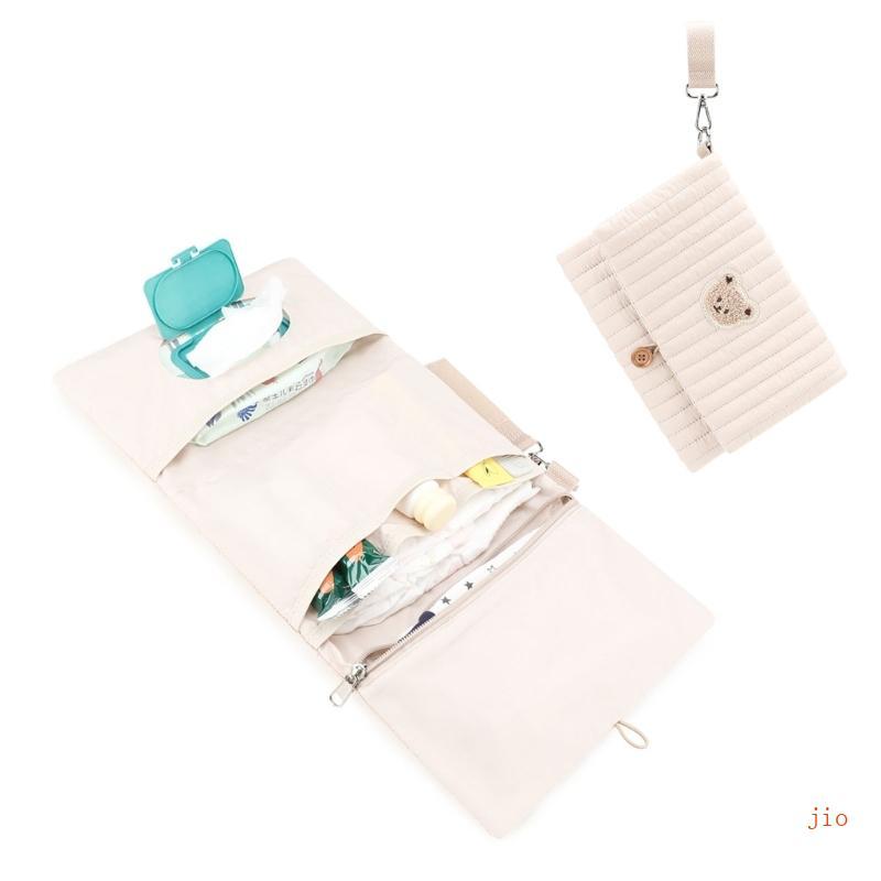 Jio กระเป๋าผ้าอ้อมสําหรับเดินทางขนาดกะทัดรัดพร้อมสายรัดที่ถอดออกได้กันน้ําพับได้โซลูชันการจัดเก็บการ