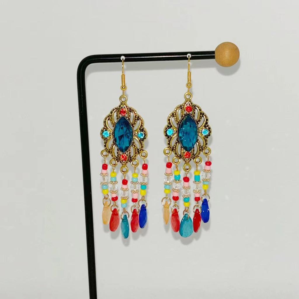 ต่างหูพู่โบฮีเมียนจากยูนนาน Lijiang Dali ในสไตล์ชาติพันธุ์ Retro Court