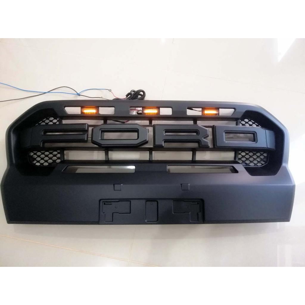 กระจังหน้า Ford Ranger 2018-2021  F.7  มีไฟส้ม 3 จุด โลโก้ดำล้วน  Wildtrack - LA -