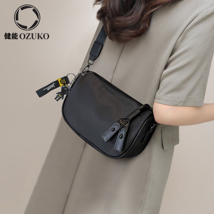 Geneneneng 2025 High-End สไตล์ใหม่ One-Shoulder แฟชั่นกระเป๋าเดินทาง Casual ยอดนิยมน้ําหนักเบา All-Match Oxford ผ้า Mess