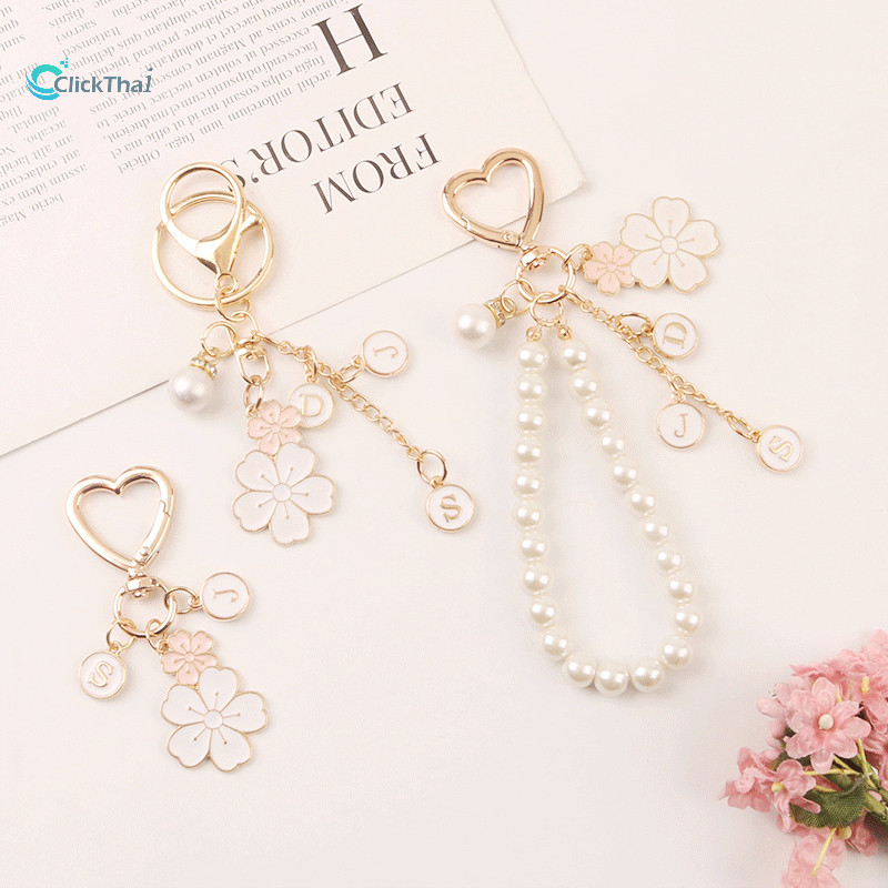 โรแมนติกเชอร์รี่รักพวงกุญแจไข่มุกจี้หัวใจสาวน่ารักสุทธิสีแดง ins กระเป๋าแขวนความคิดสร้างสรรค์ที่กำหน