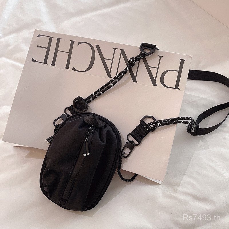 กระเป๋าสะพายข้างขนาดเล็กสำหรับฤดูใบไม้ผลิและฤดูร้อน ดีไซน์ใหม่ มีสายคล้องคอสะดวก เหมาะกับทุกโอกาส NS