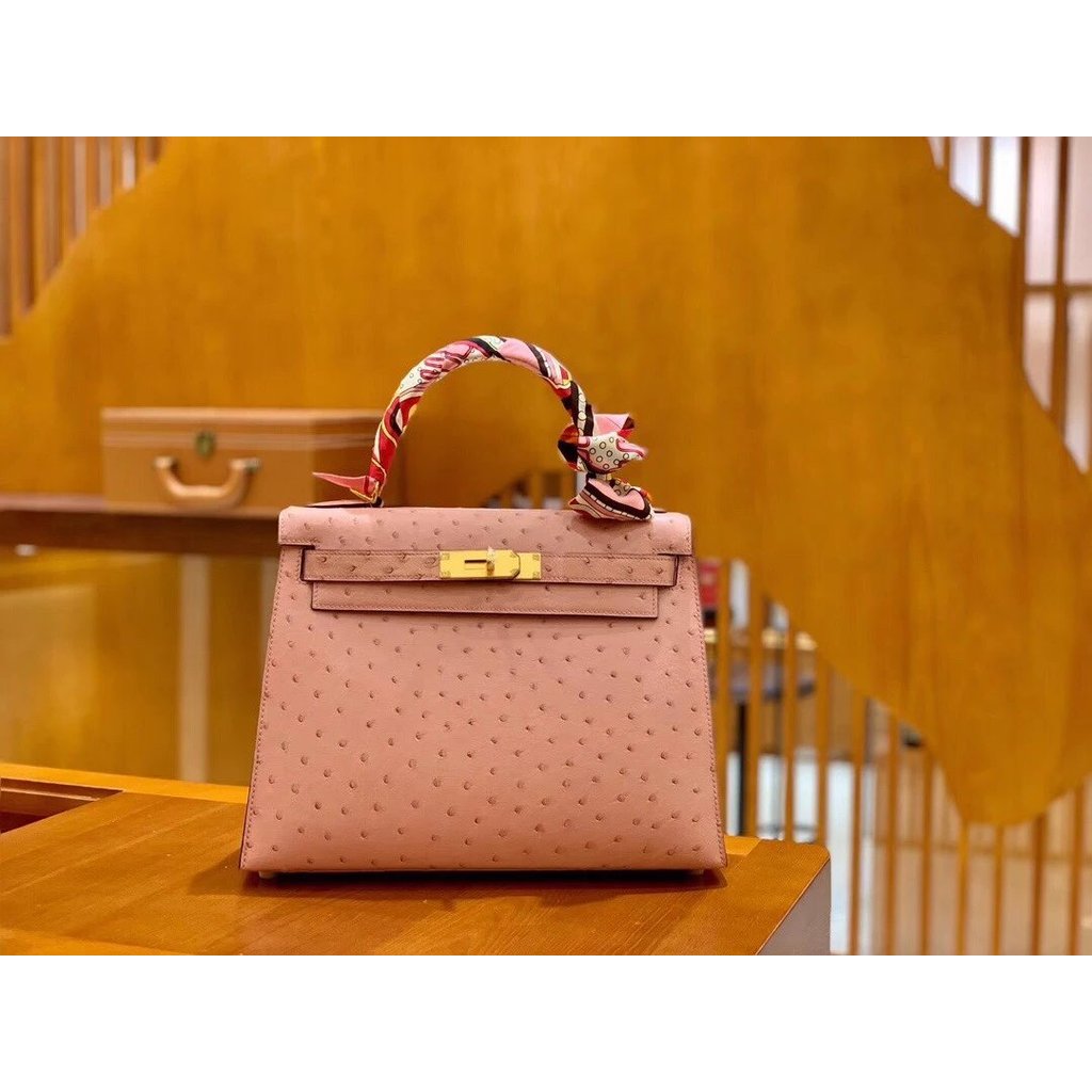 Kelly 28cm สีเชอร์รี่บล็อม พาวเดอร์ หนังแท้จากแอฟริกาใต้ เกรดพรีเมียม งานเย็บมือ กระเป๋าสะพายหลังและ