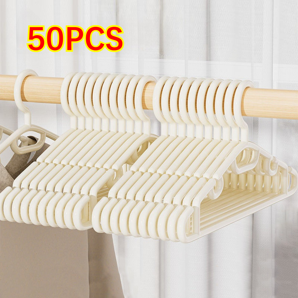 50PCS ไม้แขวนเสื้อพลาสติกกันลื่นสีขาว เหมาะสำหรับจัดระเบียบตู้เสื้อผ้า ไม้แขวนเสื้อพลาสติกบาง ไม้แขวนเสื้อ