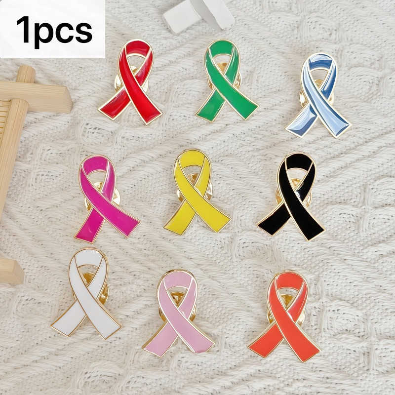 เข็มกลัดริบบิ้นหลากสี อุปกรณ์แต่งกายสำหรับงานประชาสัมพันธ์ และเป็นที่ระลึก