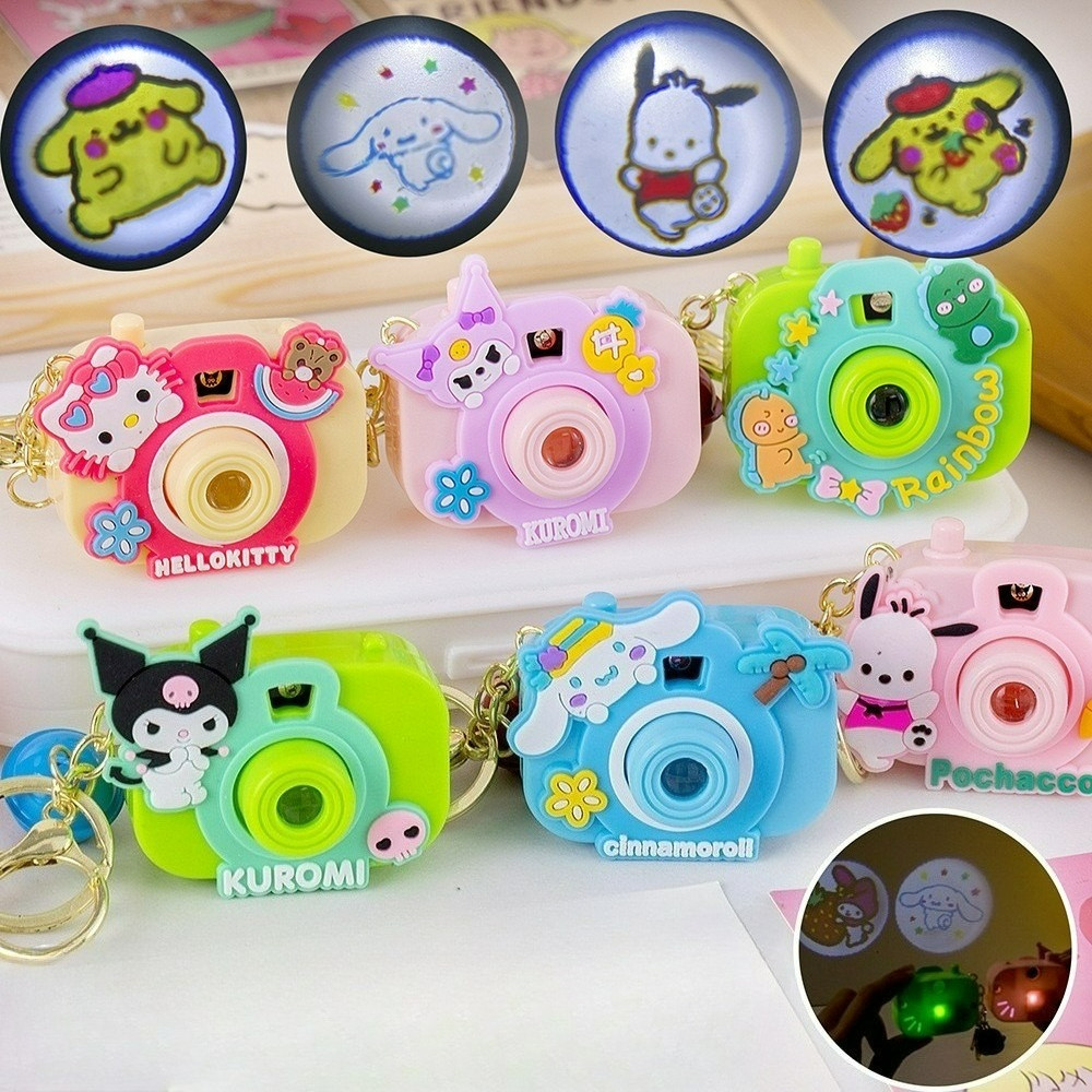 พร้อมส่ง 1ชิ้น สุ่มลาย พวงกุญแจกล้อง ฉายภาพได้ เล่นได้ มีไฟ ห้อยกระเป๋า เป็นของขวัญ น่ารักๆ
