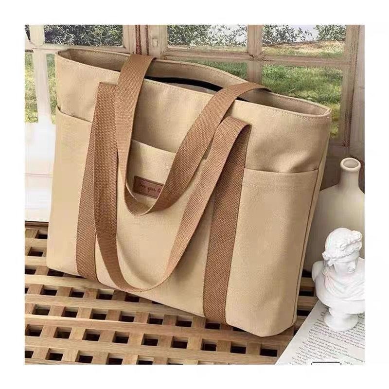 กระเป๋าโท้ทผ้าแคนวาสหนาพิเศษ ดีไซน์ญี่ปุ่นสุดมินิมอล ใช้งานได้ทุกวัน ทนทานและกันขโมยได้จริง