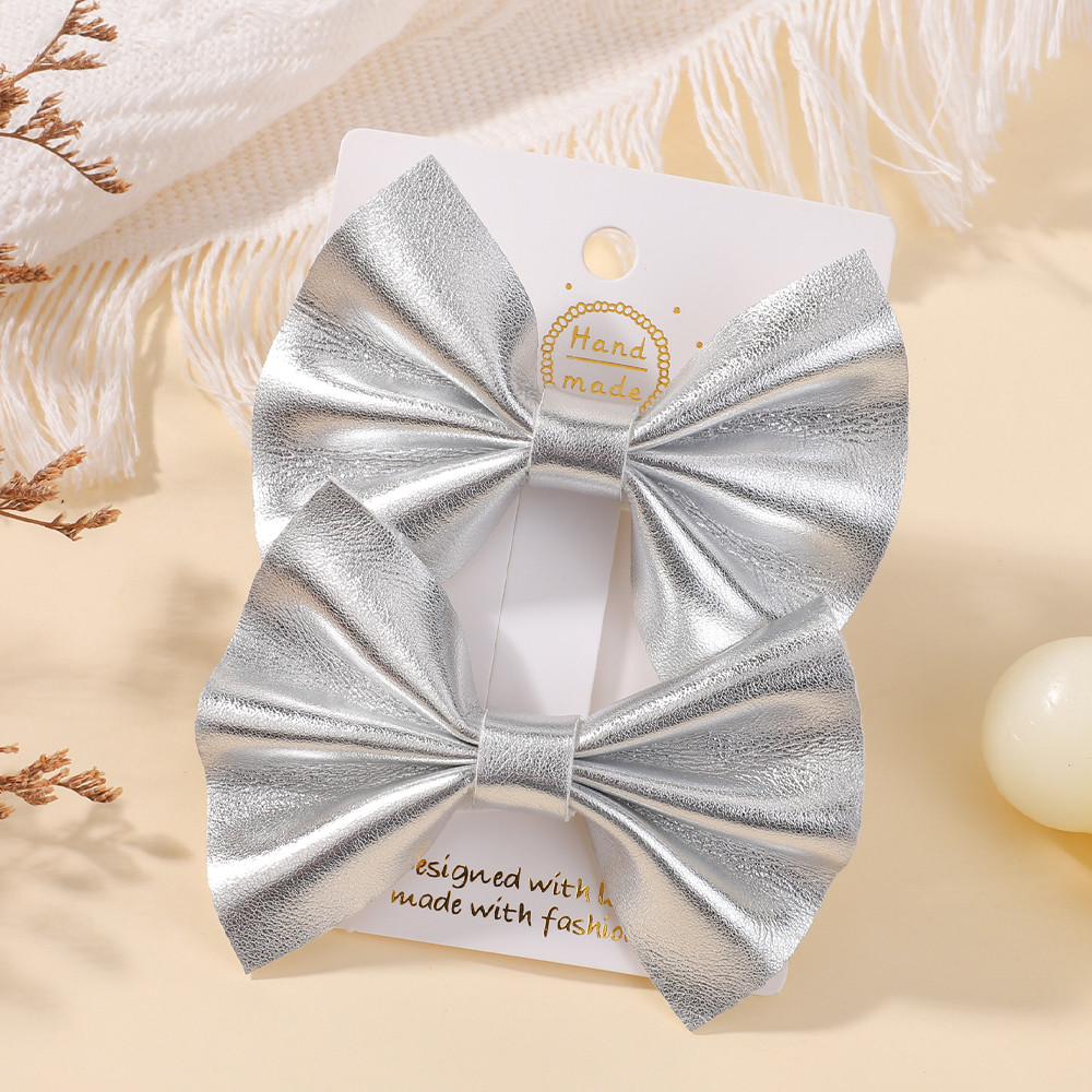 เสื้อ/set 2 อันของ bows และกิ๊บติดผมสำหรับเด็กน่ารัก พร้อมใช้งานในเทศกาล