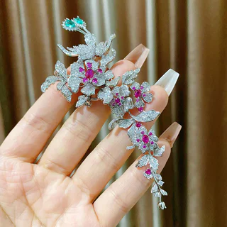 เข็มกลัดลายพู่ดอกไม้ Elegant Magpie แบบสมาร์ท น้ำหนักเบาทrès;เพิ่มความสวยงามด้วยแซฟไฟร์เล็กๆ เหมาะสำหรับคนชอบสไตล์หรูหรา