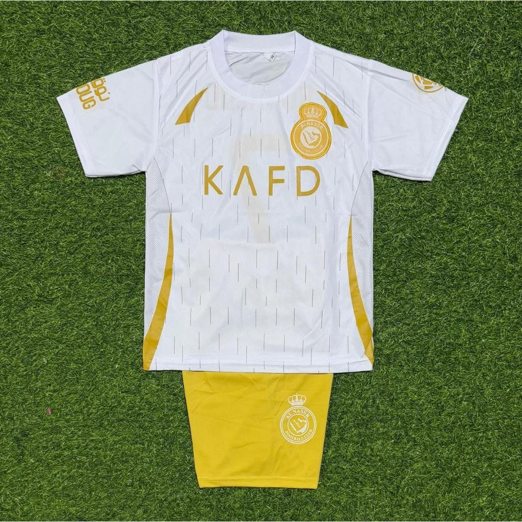 Safiq Olshop23 - เสื้อฟุตบอลเด็ก Ronaldo/Messi ล่าสุด AL NASSR 2025 ชุดฟุตบอลเด็ก อายุ 1-14 ปี
