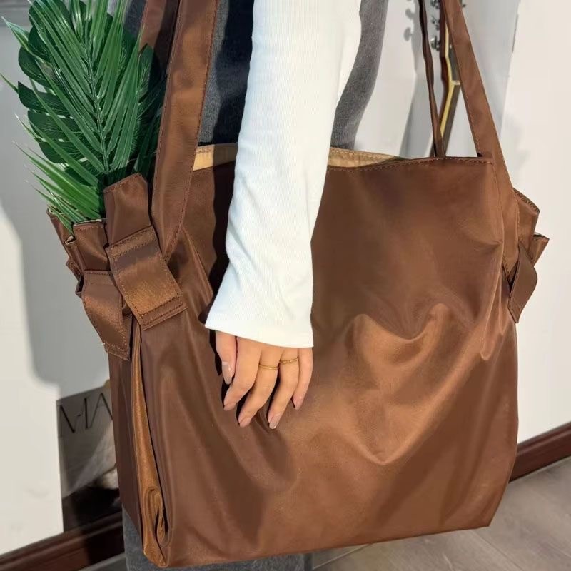 กระเป๋าเดินทางความจุขนาดใหญ่กลางแจ้งCamping Tote Bag One-Click Storageสไตล์ใหม่All-Matchกระเป๋าหญิงไหล่เดียวCross @-