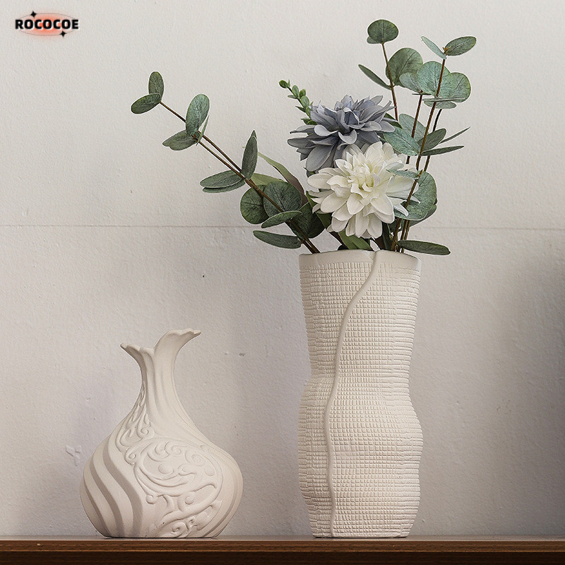 Nordic เซรามิค Unglazed สีขาวศิลปะแจกัน Creative Simple Luxury ดอกไม้เรือตกแต่งบ้านสํานักงานหัตถกรรม
