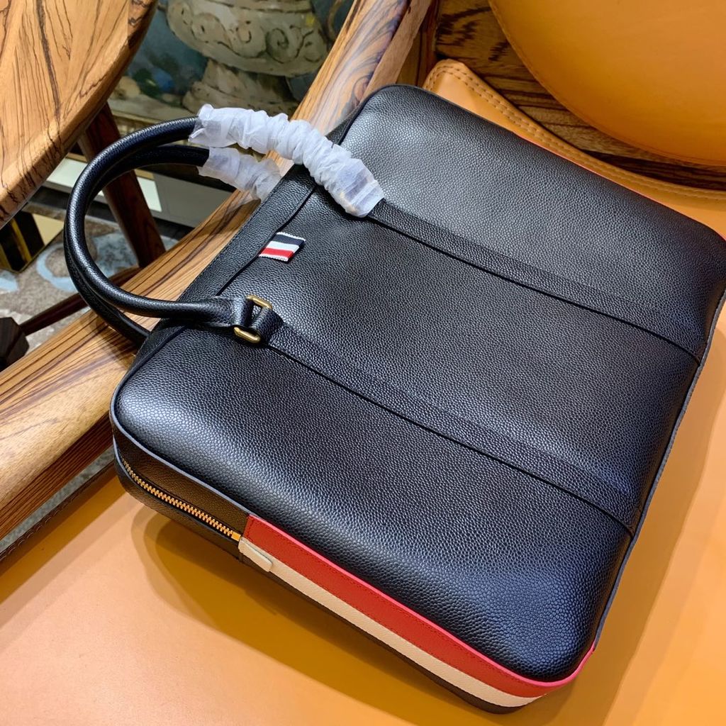 T TB Tom กระเป๋าเอกสารผู้ชายสไตล์ใหม่กระเป๋าหนังวัว thhom Simple Generous Browne Browne