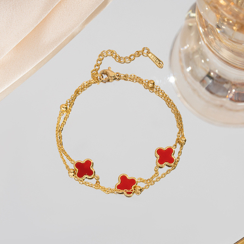 สร้อยข้อมือรูปใบโคลเวอร์สี่แฉกทำจากเหล็กไททาเนียมทอง 18k สำหรับผู้หญิง ดีไซน์สองชั้น ของขวัญให้แฟนสาว