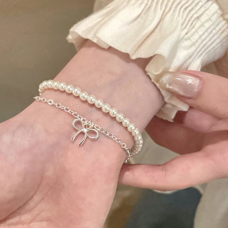 COD-ในไทย สร้อยข้อมือโบว์ ไข่มุก สองชั้น ประณีตไฮเอนด์ ผู้หญิงที่ แฟชั่น ของขวัญวาเลนไทน์ ปรับขนาดได้-Kri