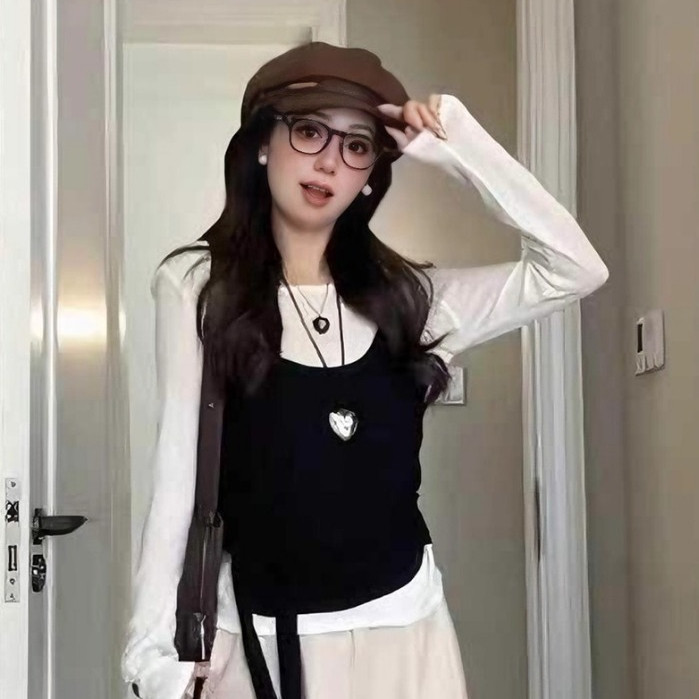 Paula พร้อมส่ง🌴เสื้อยืแขนยาวผู้หญิง🌴เสื้อ2ชิ้นติดกับดีไซน์โปว์ผูกเอว เสื้อครอปทรงเข้ารูป สีดำ คอกลม ลำลอง แฟชั่นผู้หญิ - รูปที่ 5