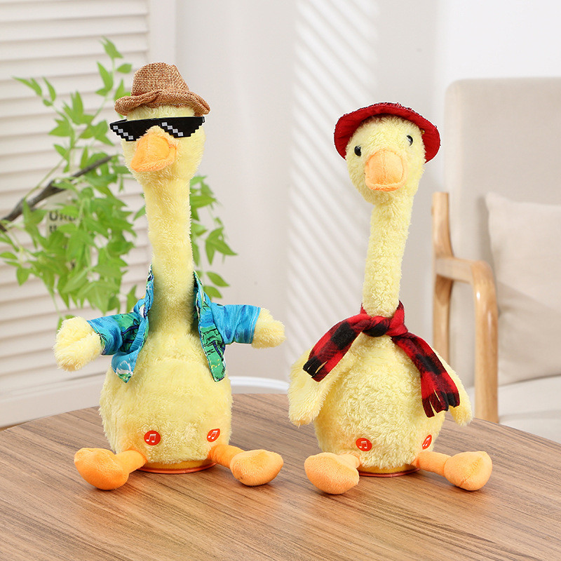 เป็ดซ้ําประติมากรรมทรายเรียนรู้ลิ้นเป็ดคอคดเคี้ยวร้องเพลงเต้นรําเป็ดตุ๊กตาไฟฟ้าเรียนรู้ลิ้นเป็ดสังคม