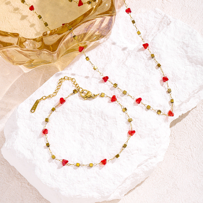 สร้อยคอมีดีไซน์สร้างสรรค์ สแตนเลสฝัง Red Love Zircon ในสไตล์อเมริกันและยุโรปสำหรับผู้หญิง