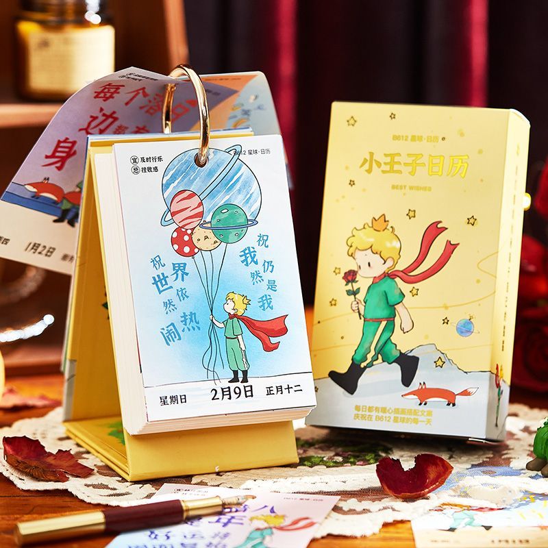 ปฏิทินดาวเคราะห์ B612 ปี 2025 ปฏิทินตั้งโต๊ะ ของขวัญของตกแต่งบ้าน น่ารัก บำบัดความเครียด ปฏิทินเจ้าช