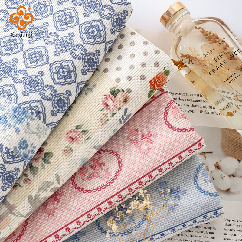ผ้าลูกฟูกสำหรับDIY พร้อมลายดอกไม้สีชมพูและสีฟ้า ขนาด0.5หลา