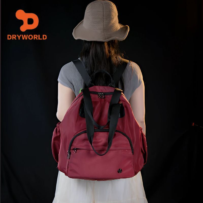 Dryworld กระเป๋าเป้สำหรับฤดูกาลใบไม้ร่วงและหนาว ความจุขนาดใหญ่ สไตล์อินเทรนด์ เพื่อการเดินทางและการทำงาน