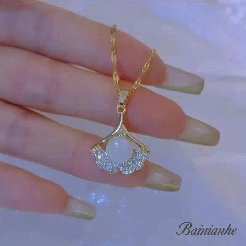 Sansheng ชุบทอง 15K พร้อมสร้อยคอจี้แอปริคอทและโซ่กระดูก สไตล์ใหม่