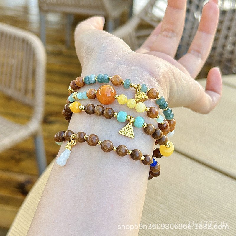 สร้อยข้อมือลูกปัด Lapiz Lazuli ทำมือจากไม้จันทร์และหยกธรรมชาติ เหมาะสำหรับผู้หญิง