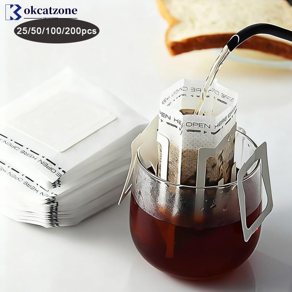 OKCATZONE 25/100/200pcs กระดาษกรองกาแฟถุงกระดาษทิ้งหยดกาแฟกระเป๋าจับแขวนหู Espresso Coffee อุปกรณ์เส