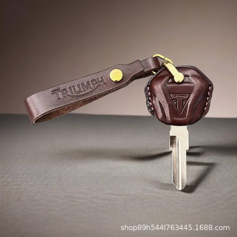 Triumph Locomotive T110 ฝาครอบกุญแจ T900 ดัดแปลง T120 Retro Climbing 660 กระเป๋ากุญแจ bobber Buckle 