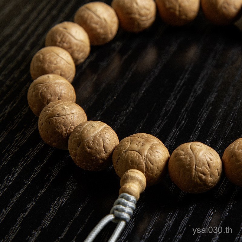 สร้อยข้อมือพรีเมียมด้วยลูกปัด Nepali Coconut และองค์ประกอบพิเศษ Phoenix Eye, Kirin Eye พร้อมพระพุทธร
