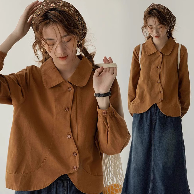 99201เสื้อเชิ้ตสไตล์ย้อนยุคสำหรับผู้หญิงตัวใหม่นี้มีคอปกปีเตอร์แพนทรงไม่สม่ำเสมอและเหมาะสำหรับการสวมใส่ในฤดูใบไม้ร่วง