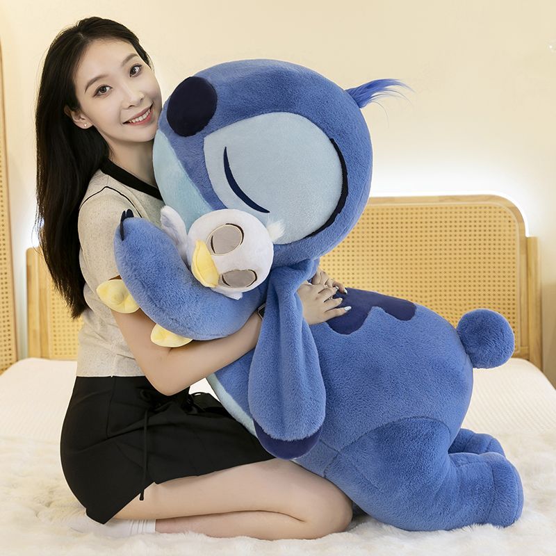 Stitch ตุ๊กตาขนยาวที่ดูน่ารัก ตัดเย็บไว้กับตุ๊กตาเป็ดที่มีขนยาวเต็มไป เป็นของขวัญสําหรับเด็กหญิง