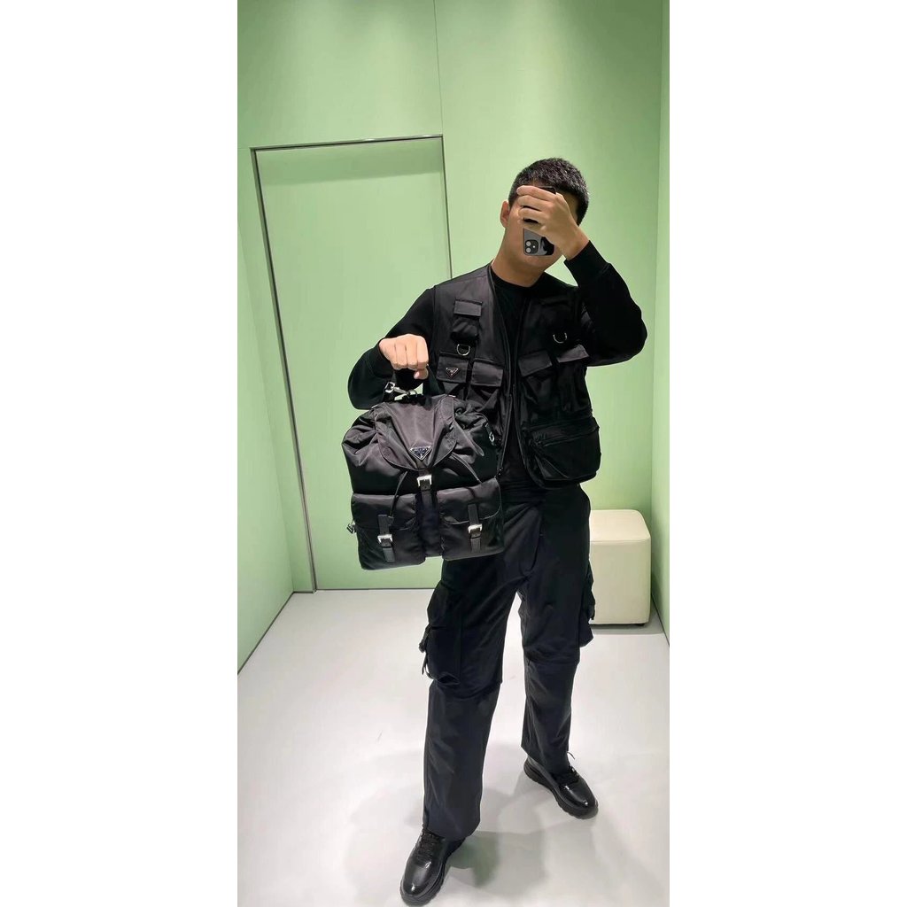 พีดี 2024 กระเป๋าผู้ชายสไตล์ใหม่กระเป๋าเป้สะพายหลังกระเป๋าเป้สะพายหลังกระเป๋าเป้สะพายหลัง 2VZ110 + ห