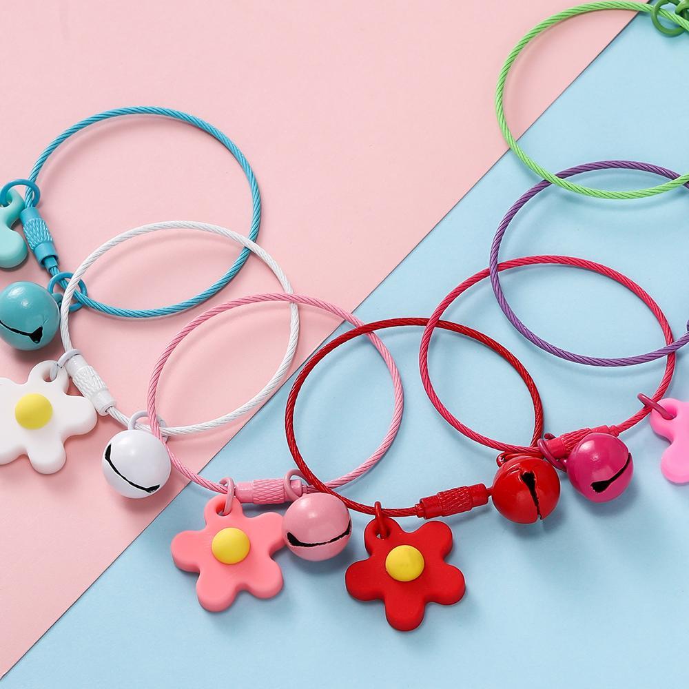 St.kunkka 1ชุดของสไตล์น่ารักพวงกุญแจดอกไม้ระฆังกริ๊งกริ๊งระฆังพวงกุญแจกระเป๋าเป้สะพายหลังมินิจี้กุญแจเสน่ห์ - รูปที่ 5