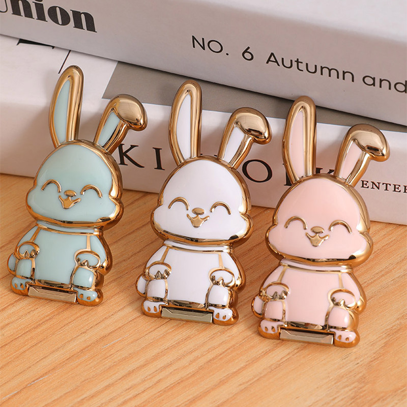 ที่วางโทรศัพท์มือถือ ลายการ์ตูนกระต่าย สามารถจับคู่กับโทรศัพท์มือถือทุกรุ่น แบบสติกเกอร์ พับได้ แบบสร้างสรรค์ Stand