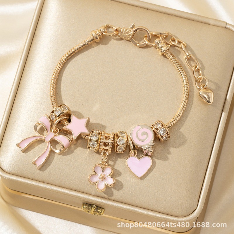 สร้อยข้อมือทันสมัย DIY ลูกปัดสีชมพู ลายหัวใจและตุ๊กตาลูกอมแบบบอย พร้อมอัญมณีดอกไม้