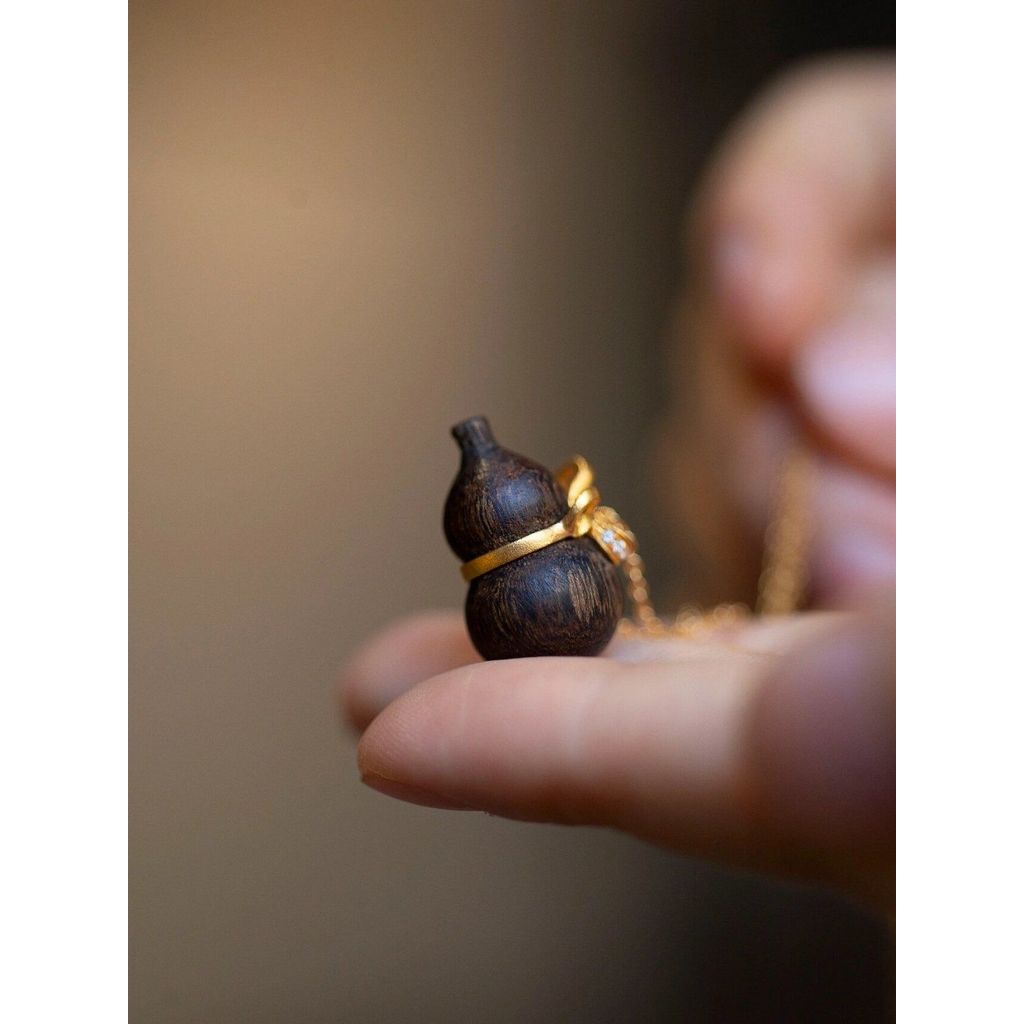 ไม้กฤษณามะระจี้สร้อยคอหมายถึงโชคลาภคู่โชคดีคู่ประณีตทุกการแข่งขันสไตล์จีนโบราณสไตล์จีนใหม่ [FYB]