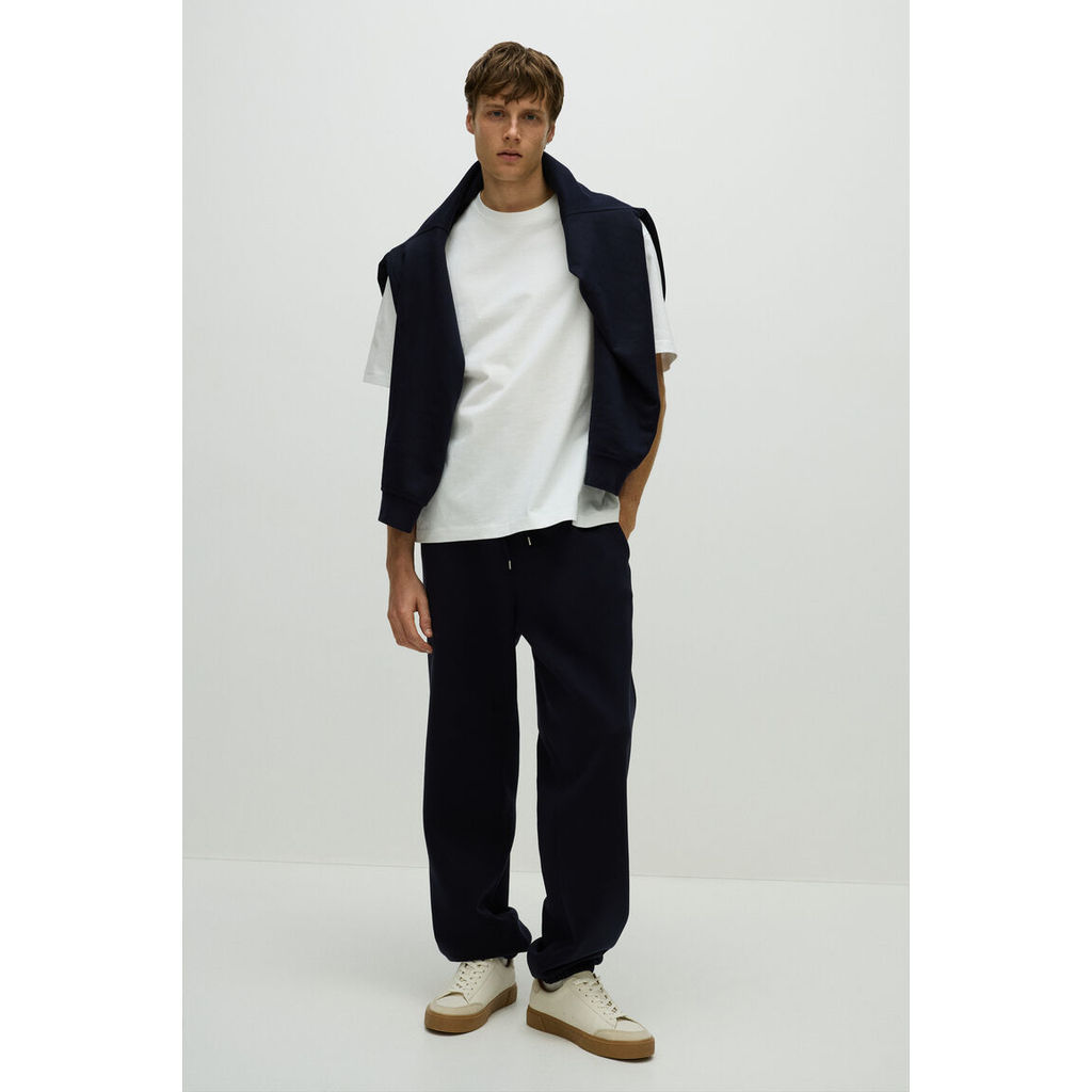 H&M(เอชแอนด์เอ็ม) กางเกงวอร์มแบบหลวมพอดีตัว ผู้ชาย 1012056