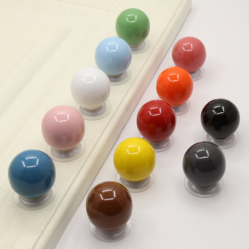 การเจาะ-ฟรีเซรามิกตู้มือจับประตูลูกอมสีกล่องเก็บจับลิ้นชักสีตู้เสื้อผ้ารองเท้ารับประทานอาหารด้านข้าง