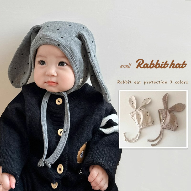 หมวกหูกระต่ายลายจุดสำหรับเด็กวัยหัดเดิน อายุ 0-12 เดือน ออกแบบมาให้สวมใส่ง่าย พร้อมฟังก์ชันป้องกันหูและสามารถปรับขนาดตามต้องการ