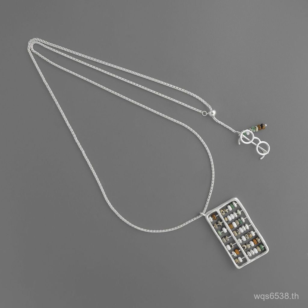 เสื้อกันหนาวสไตล์วินเทจจาก Wu Xin SONG ออกแบบเหมือนสร้อยคอลูกคิดและบัญชีห้องนาย พร้อมกลิ่นอายเซน กุญ